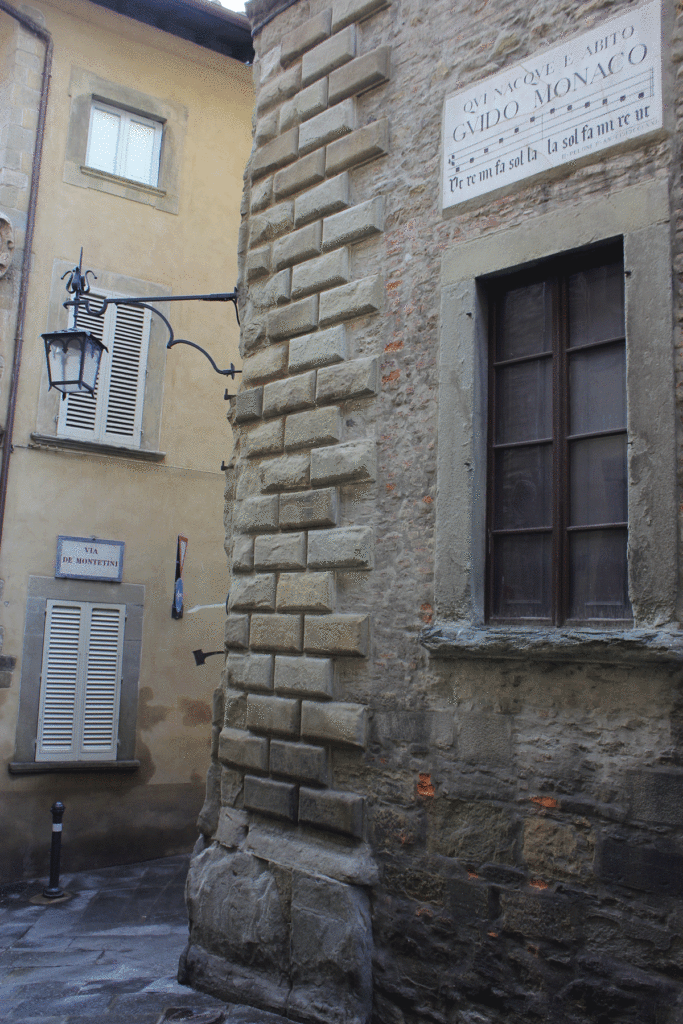 house with lamp and window and sign