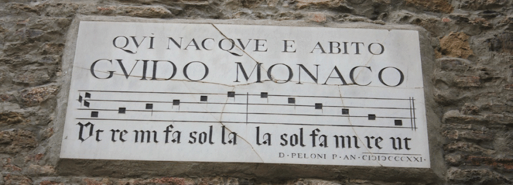Sign on Guido's house: Guido the monk lived here with the notes of the scale