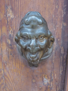 door handle in the shape of a head of a man