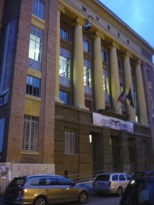 museum facade with stone columns and windows