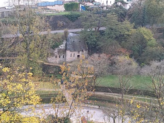 Ancient stone building Luxembourg City from the train