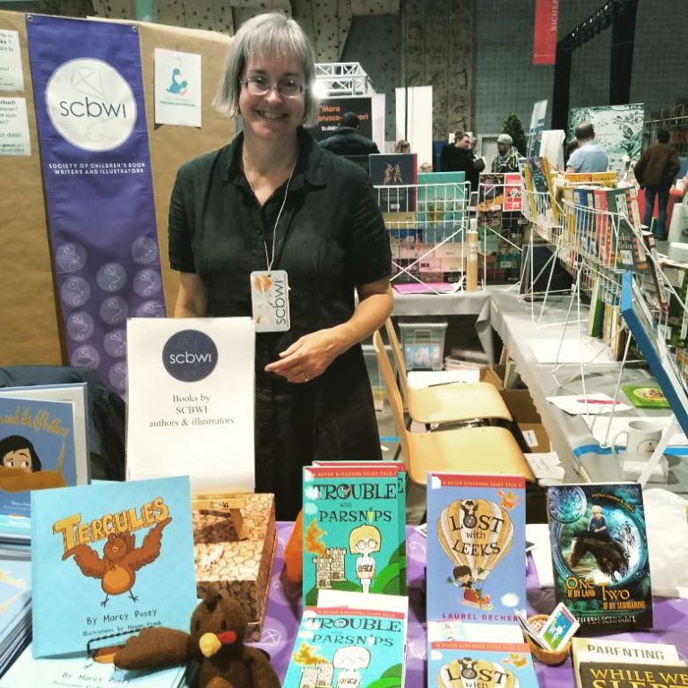 Laurel Decher with Seven Kingdoms Fairy Tales at walferbicherdeeg book fair