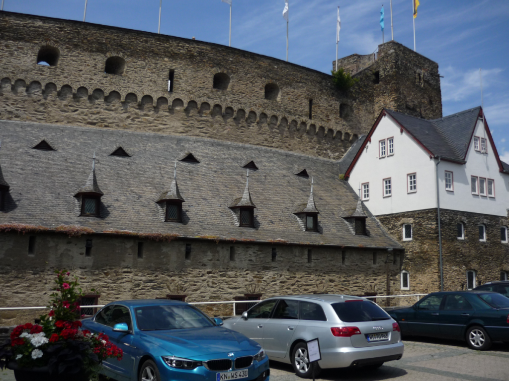 a row of tiny windows at the top wall of the fortress