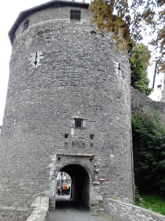 Stone tower with doorway through the middle.
