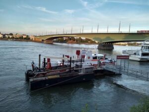 sunset on the Rhine River with the fire department boat