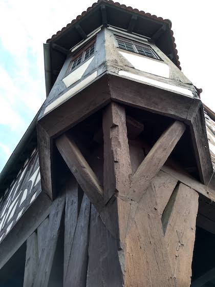 City hall beams from below are thicker than a human head