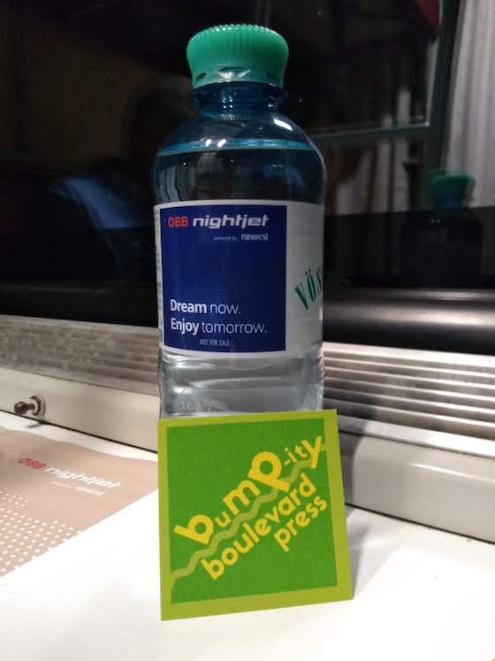 Bumpity Boulevard card with water bottle with Nightjet slogan Dream now, enjoy tomorrow