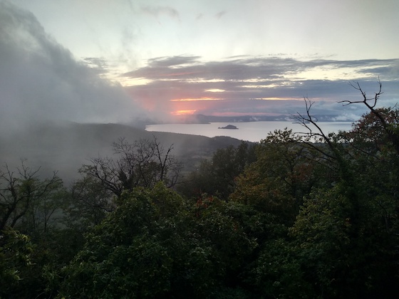 Stronger mists at sunset make Lake Bolsena look even more like a volcano.